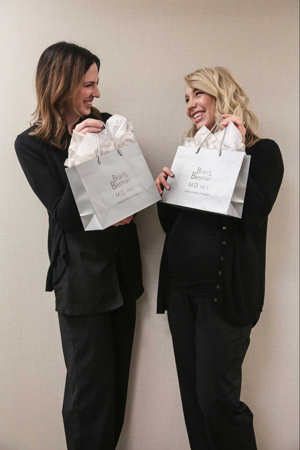 Staff showing presents for the holidays at the office of Dr. Brian Biesman in Nashville, TN